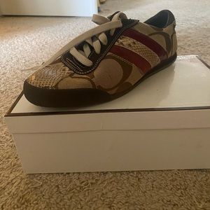 Brand new still in box classic coach sneakers.